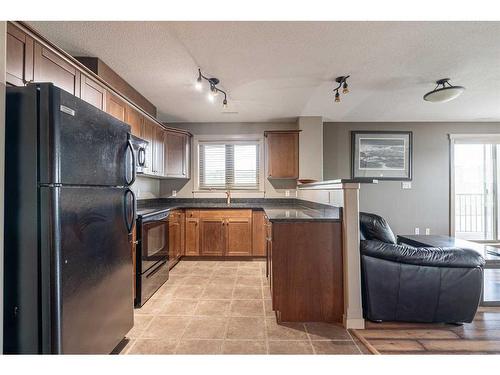 705-8535 Clearwater Drive, Fort Mcmurray, AB - Indoor Photo Showing Kitchen