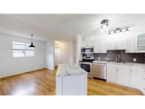 144 Cruickshank Road, Fort Mcmurray, AB - Indoor Photo Showing Kitchen With Stainless Steel Kitchen