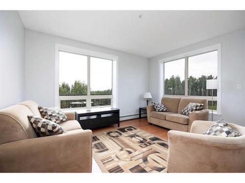 2405-204 Sparrow Hawk Drive, Fort Mcmurray, AB - Indoor Photo Showing Living Room