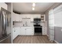 119-400 Silin Forest Road, Fort Mcmurray, AB  - Indoor Photo Showing Kitchen With Stainless Steel Kitchen 