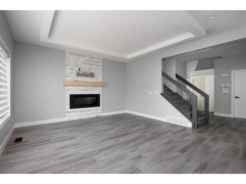 210 Prospect Drive, Fort Mcmurray, AB - Indoor Photo Showing Living Room With Fireplace