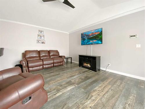 157 Gregoire Crescent, Fort Mcmurray, AB - Indoor Photo Showing Living Room With Fireplace