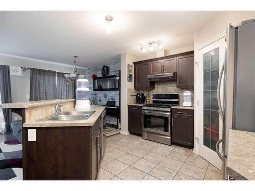 121 Sandstone Lane, Fort Mcmurray, AB - Indoor Photo Showing Kitchen With Double Sink