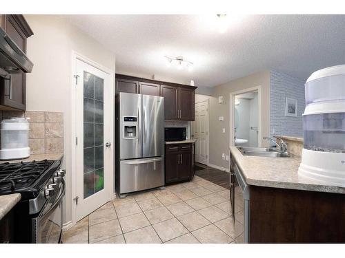 121 Sandstone Lane, Fort Mcmurray, AB - Indoor Photo Showing Kitchen With Double Sink With Upgraded Kitchen