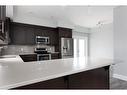 224 Siltstone Place, Fort Mcmurray, AB  - Indoor Photo Showing Kitchen With Stainless Steel Kitchen With Double Sink With Upgraded Kitchen 