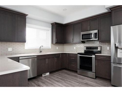 224 Siltstone Place, Fort Mcmurray, AB - Indoor Photo Showing Kitchen With Stainless Steel Kitchen With Upgraded Kitchen