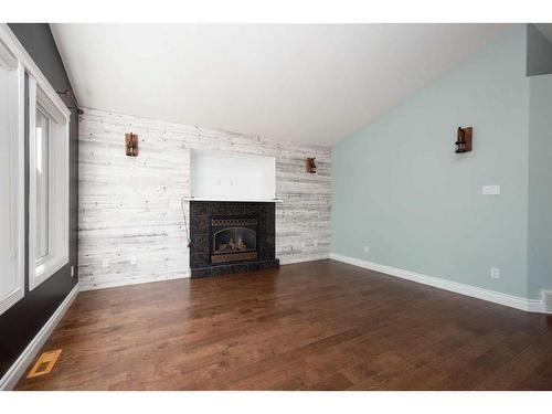 329 Mustang Road, Fort Mcmurray, AB - Indoor Photo Showing Living Room With Fireplace