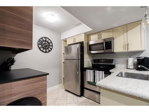 361 Diefenbaker Drive, Fort Mcmurray, AB - Indoor Photo Showing Kitchen With Stainless Steel Kitchen