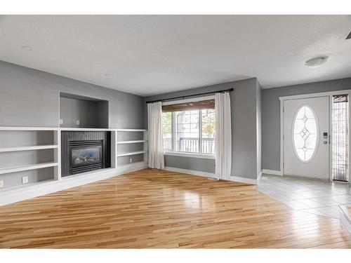 361 Diefenbaker Drive, Fort Mcmurray, AB - Indoor Photo Showing Living Room With Fireplace