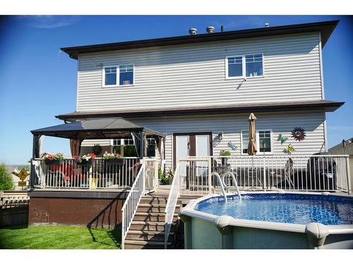 463 Killdeer Way, Fort Mcmurray, AB - Outdoor With Above Ground Pool With Deck Patio Veranda