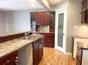 129 O'Coffey Crescent, Fort Mcmurray, AB  - Indoor Photo Showing Kitchen With Double Sink 