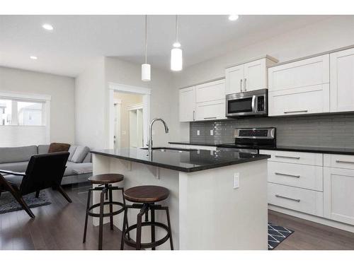 161 Chalifour Street, Fort Mcmurray, AB - Indoor Photo Showing Kitchen With Upgraded Kitchen