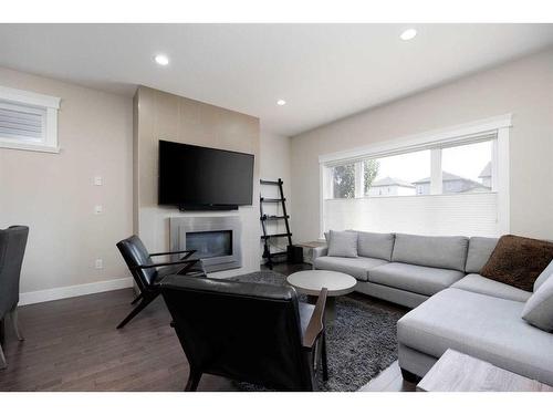 161 Chalifour Street, Fort Mcmurray, AB - Indoor Photo Showing Living Room With Fireplace