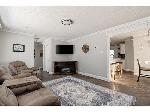 399 Cornwall Drive, Fort Mcmurray, AB - Indoor Photo Showing Living Room With Fireplace