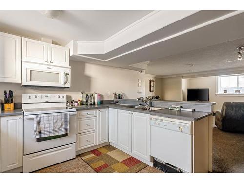 399 Cornwall Drive, Fort Mcmurray, AB - Indoor Photo Showing Kitchen With Double Sink