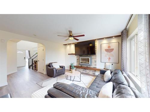 164 Jw Mann Drive, Fort Mcmurray, AB - Indoor Photo Showing Living Room With Fireplace