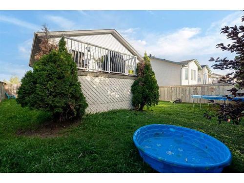 235 Williams Drive, Fort Mcmurray, AB - Outdoor With Above Ground Pool With Deck Patio Veranda With Backyard