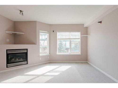 405-123 Arabian Drive, Fort Mcmurray, AB - Indoor With Fireplace