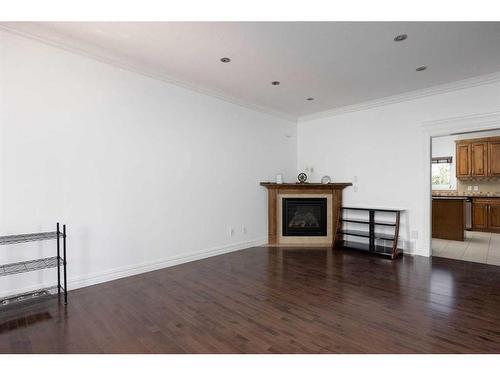 322 Grosbeak Way, Fort Mcmurray, AB - Indoor Photo Showing Other Room With Fireplace