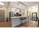 2107-204 Sparrow Hawk Drive, Fort Mcmurray, AB  - Indoor Photo Showing Kitchen With Stainless Steel Kitchen With Upgraded Kitchen 