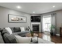 05-193 O'Coffey Crescent, Fort Mcmurray, AB  - Indoor Photo Showing Living Room With Fireplace 