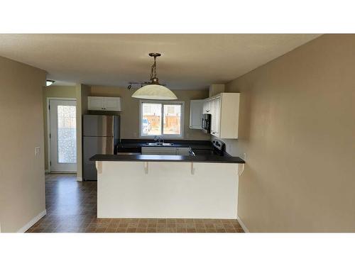 29-100 Millennium Gate, Fort Mcmurray, AB - Indoor Photo Showing Kitchen With Double Sink