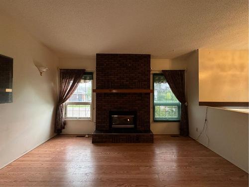 280 Beaton Place, Fort Mcmurray, AB - Indoor Photo Showing Living Room With Fireplace