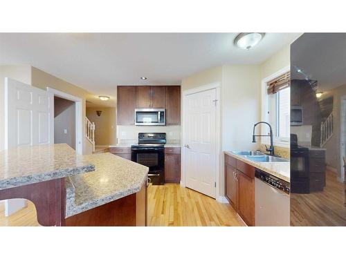 232 Coyote Crescent, Fort Mcmurray, AB - Indoor Photo Showing Kitchen With Double Sink With Upgraded Kitchen