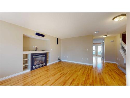 232 Coyote Crescent, Fort Mcmurray, AB - Indoor Photo Showing Living Room With Fireplace