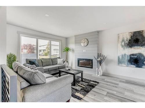 213 Sitka Drive, Fort Mcmurray, AB - Indoor Photo Showing Living Room With Fireplace