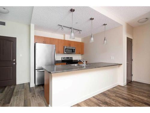 207-136A Sandpiper Road, Fort Mcmurray, AB - Indoor Photo Showing Kitchen With Double Sink