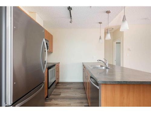 207-136A Sandpiper Road, Fort Mcmurray, AB - Indoor Photo Showing Kitchen With Double Sink