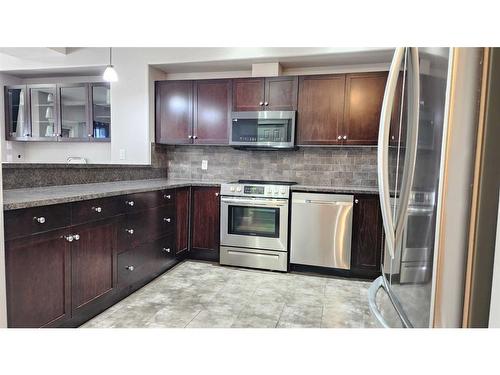 8-313 Millennium Drive, Fort Mcmurray, AB - Indoor Photo Showing Kitchen With Stainless Steel Kitchen