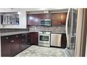 8-313 Millennium Drive, Fort Mcmurray, AB  - Indoor Photo Showing Kitchen With Stainless Steel Kitchen 