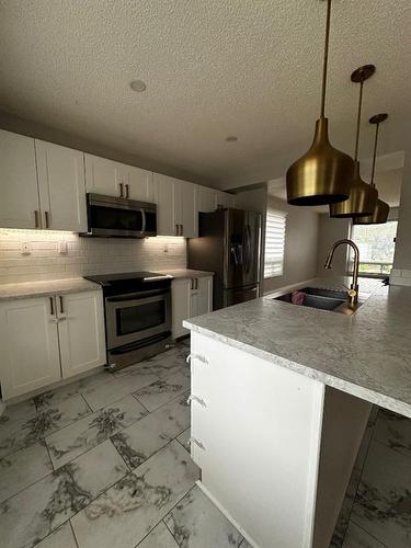 109 Robichaud Street, Fort Mcmurray, AB - Indoor Photo Showing Kitchen