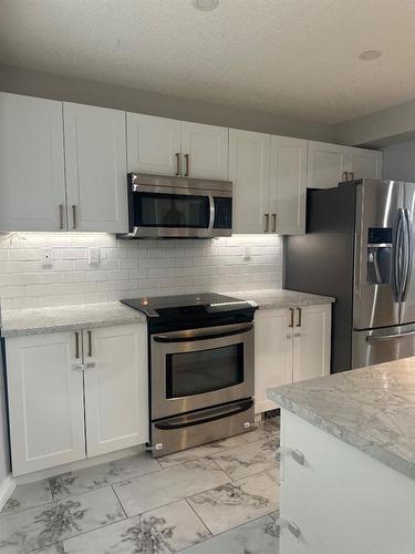 109 Robichaud Street, Fort Mcmurray, AB - Indoor Photo Showing Kitchen