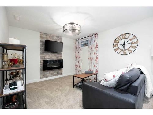 129 Robinson Lane, Fort Mcmurray, AB - Indoor Photo Showing Other Room With Fireplace