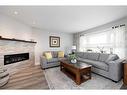 129 Robinson Lane, Fort Mcmurray, AB  - Indoor Photo Showing Living Room With Fireplace 