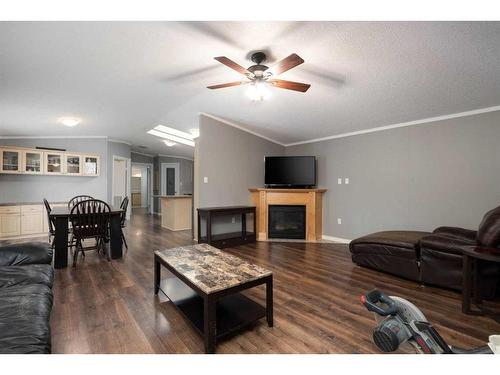 182 Cedar Street, Fort Mcmurray, AB - Indoor Photo Showing Living Room With Fireplace