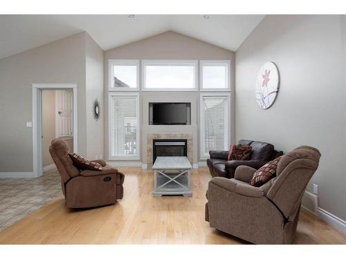 180 Mountain Avens Crescent, Fort Mcmurray, AB - Indoor Photo Showing Living Room With Fireplace