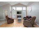 180 Mountain Avens Crescent, Fort Mcmurray, AB  - Indoor Photo Showing Living Room With Fireplace 