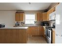 180 Webb Drive, Fort Mcmurray, AB  - Indoor Photo Showing Kitchen 