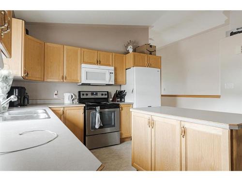 180 Webb Drive, Fort Mcmurray, AB - Indoor Photo Showing Kitchen With Double Sink