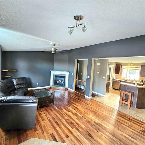 103 Laura'S Spruce Dr, Lac La Biche, AB - Indoor Photo Showing Living Room With Fireplace