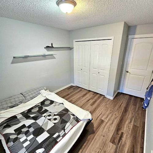 103 Laura'S Spruce Dr, Lac La Biche, AB - Indoor Photo Showing Bedroom