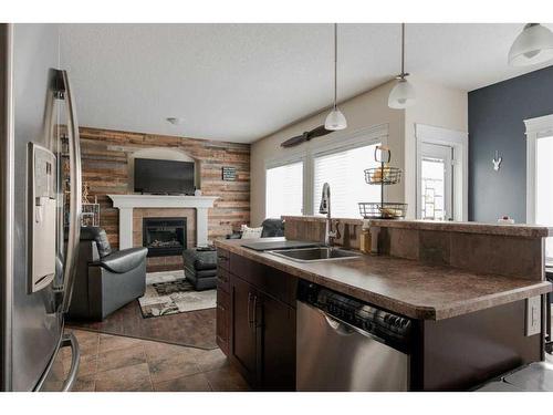 135 Crane Place, Fort Mcmurray, AB - Indoor Photo Showing Other Room With Fireplace