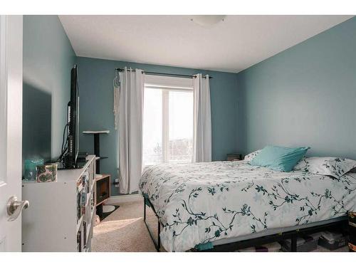 135 Crane Place, Fort Mcmurray, AB - Indoor Photo Showing Bedroom