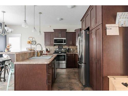 135 Crane Place, Fort Mcmurray, AB - Indoor Photo Showing Kitchen With Upgraded Kitchen