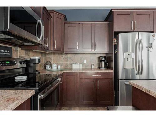 135 Crane Place, Fort Mcmurray, AB - Indoor Photo Showing Kitchen