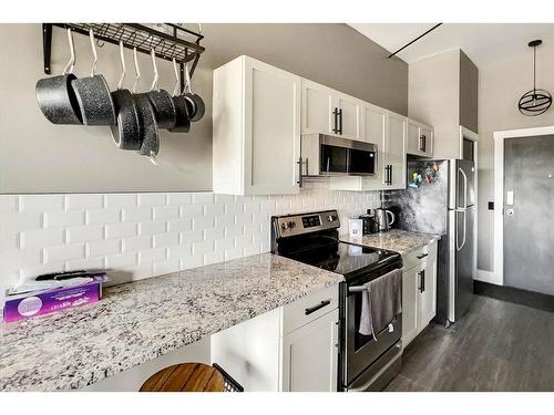 309-8026 Franklin Avenue, Fort Mcmurray, AB - Indoor Photo Showing Kitchen With Upgraded Kitchen